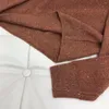 Pantaloni a due pezzi da donna Vintage elegante gonna lavorata a maglia di seta brillante set manica lunga o-collo maglione a trapezio vestito 2 pezzi