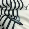 メンズカジュアルシャツ夏の色コントラストポートレートプリントメンメンストリートウェアソーシャルブルサカミサマスキュリナハワイケミーズホム