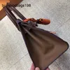 Sac à main pour femmes sacs de maison faits à la main nouvelle petite maison européenne et américaine sac en cuir platine couche de tête en peau de vache crocodile couleur contrastée décontracté avec logo