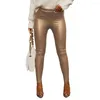女性用パンツ女性ソリッドカラースキニーフェイクレザーバットリフト春のズボン
