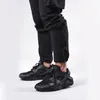 Męskie spodnie biegające do joggingu czarne luźne joggery streetwear swobodny sport