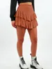 スカートファッションプレーンカラー女性の夏のプリーツスカートセクシーな女の子ロータスリーフショート