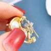 Imitacja Pearl Snowman Broothes for Women Warunek narciarni miotła Snowflake Pins Lapel Pins świąteczne biżuterię Nowy Rok prezenty broszkowe