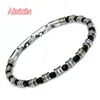 Bracelets de charme de haute qualité Agate à facettes noires Perles rondes Bracelet en acier inoxydable pour bijoux pour hommes de mode 230907