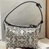 Kvinnors lyxdesigner väska bento box enkel axel handväska ny duk jacquard mönster tygväska mode mode stor kapacitet underarmsäck 90% fabriks het försäljning