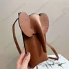 Bolsa telefónica de diseñador Lowwe Nuevo de cuero puro sólido elefante Mini billetera de cuerpo cruzado de moda y versátil súper lindo