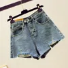 Shorts pour femmes tendance belle été femmes streetwear trou jambe large bleu denim vintage femme lâche taille haute jean noir