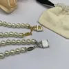 vivienne designer 2023 new Pearl Saturn necklace fashion European and American Pearl necklace superior sense simple planet collarbone chain