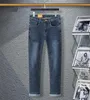 2023 Pantaloni casual in denim autunno/inverno firmati da uomo Pantaloncini in denim classici strappati per uomo e donna taglia asiatica 28-38