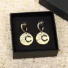 Top quality Charm round shape drop earring with black color design in 18k gold plated have box stamp PS7650B269M