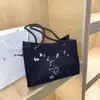 2023 nova rede popular moda tote lazer feminino um ombro portátil lona grande capacidade saco de compras tomada barata 50% de desconto