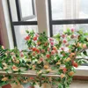 Kwiaty dekoracyjne 2pcs/partie fałszywe róże jedwab bluszcz winorośli sztuczne zielone rośliny girland dom