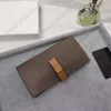 Carteira de designer de couro de alta qualidade bolsa zero nova bolsa de cartão moda simples grande capacidade clipe multi-cartão masculino e feminino luxo longo estilo curto bolsa de mão
