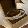 Bracciale rigido versione coreana del temperamento della moda leggero lusso di alta qualità delicato bicolore pieno di diamanti design di nicchia raffinato braccialetto semplice