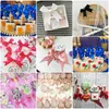 زينة عيد الميلاد 50200pcs أقواس الشريط الساتان الساتان الأقواس الصغيرة القوس زهرة الزهرة الديكور اليدو