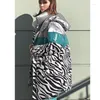 Trench da donna 2023 Cappotto invernale da donna Donna con cappuccio Manica lunga Sciolto Zebra a righe Piumino Mantello Abiti da neve Cotone