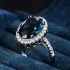 Anello solitario Huitan Charming Blue CZ Anelli da donna Accessori per feste di nozze Bling Graceful Anello da sposa Gioielli alla moda all'ingrosso 230907