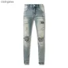 American 2023 Amiirii Fashion Jean Purple Demin Jeans High Mens Street Mud黄色のカシューフラワーブロークンホールパッチライブ