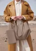 2023Designer French Half Moon Paris Bag Bolso de cuero de becerro liso texturizado de grano completo Mujer Silla de montar Bolso de axila Crossbody Hobo Bolsos Mini Hombro Cognac Camel Bag