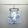 2 Moda Mens Mulheres Verão Fatos Esportivos Ternos Casuais Clássico Carta Padrão Impressão Masculino Manga Curta Shorts Homens Tops Meninos Camisetas Cores Roupas # 310