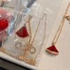 2023 new V Pendant Small Skirt Mosan Diamond Rose Gold Red Jade Necklaces High quality