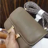 Créateur de mode Stewardess Cancan Sac Top Handbag Metal Metal Boutle Purse Luxury Palmprint Cowhide Small Square Crossbody Sac