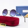 Klassisk designer solglasögon varumärke solglasögon mode kvinnor solglasögon uv400 metall rund ramspegel lins med låda a68