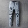 Jeans Homme Pantalon Bleu Skinny Slim Jeans Coupe Déchirée Cult Biker Moto Hip Hop Street Fashion pour Jeunes Hommes Gars Stretch Rivet Patch Jambe Droite Peinture Denim Longue Tendance