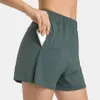 L196 Pantalon de survêtement court pour femmes, pantalon de Yoga à séchage rapide avec poches latérales, short de sport fin et décontracté, élastique, Fitness en plein air, Tr311y