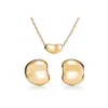 Projektant unisex żeńskie 18 -karowe złote naszyjniki dla kobiet srebrne modne fasolowe wisiorek mody biżuteria walentynkowa prezent dla dziewczynf299g