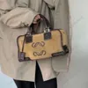 حقيبة مصممة الكتف تحمل العلامة التجارية Lowwe Retro Mid Century Wallet Flip Fur Fur Pillow Mini Cylinder Desert Yellow Crossbody Bag