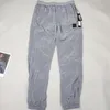 Marca Mens Topstoney Pants 19FW Classic Bordado Pequeno Metal Nylon Macals Moldes Tamanho da calça M-2xl300D