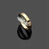 Nuevo anillo de amor de cristal cruzado Anillos de pareja de moda para hombres y mujeres Anillos de diseño de titanio 316L de alta calidad Regalos de joyería261U