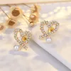 Orecchini a bottone in argento 925 con cuore dolce amore OL con brillanti cristalli di diamanti bling Orecchini in oro 18 carati di lusso con perle di design orecchini e324H