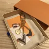 Keychain 럭셔리 디자이너 골드 메탈 키 버클 클래식 브랜드 편지 로즈 잠금 스타 펜던트 세련된 고품질 키 체인 가방 장식품
