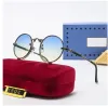 Klassisk designer solglasögon varumärke solglasögon mode kvinnor solglasögon uv400 metall rund ramspegel lins med låda a68