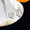 2023 Ny lyx S925 Sterling Silver smycken Lucky Move Stud Earring Round Coin Design Trendy Slide Moving CZ Cubic Zircon Stone E319B