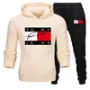 Luxe designer trainingspak met capuchon Heren trainingspak Causaal Heren Damespakken Fleece trainingspakken Sport Herfst Winter Mode hoodies Jogger joggingbroek Sportkleding