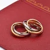 'Gold Silver RoseGold' Anillos triples cruzados de tres anillos para mujeres Hombres Amantes Alianza de boda de acero de titanio 316L Anei213r