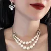 Dubbelskikt Pearl Studded Diamond Bow Necklace French Light Luxury High-End Armband Earring Set