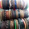 Pulseiras inteiras de couro genuíno para homens e mulheres, 100 peças, vintage, punho de surfista, presente de festa, estilo misto, joias da moda, lote 329u