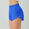 Lulu Womens Sports Yoga Shorts Höghusfodrade fickor Fitness Bär kvinnor Korta byxor flickor som kör elastisk 2,5 tum