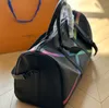 2023 Luxury Fashion Men Women Bolsas de lona de viaje de alta calidad Bolsos de equipaje de diseño con bloqueo de gran capacidad Lanling E 007