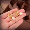 Boucles d'oreilles design Vivian luxe femmes bijoux de mode boucles d'oreilles en or métal perle boucle d'oreille cbijoutier Westwood femme 33