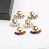 Boucles d'oreilles de créateur de marque de mode pour femmes, bijoux en diamant coloré, clous avec lettre G, accessoires de fête de luxe