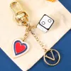 2023 Designer di marchi multicolori Multicolore Key Chain Chain Womens Fashion Cuckle Keychains Men Luxury Chiamale Celatura fatta a mano Bispettoni da donna a mano ciondolo