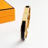 Diseño de diseñador de alta calidad Brazalete de acero inoxidable Pulsera con hebilla de oro Joyería de moda Pulseras para hombres y mujeres con box272z