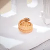 Offener Ring im Designer-Kollektionsstil für Damen, gepflasterter Diamant, Champaign-Goldfarbe, elastische Vollperlen, doppelter Kreis, Schlangenschlangenringe, hochwertiger Schmuck
