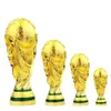 Andere Spielzeuge Banner Fußball Trophäe Souvenir Goldenes Harz Fußball Handwerk Champion Maskottchen Fan Geschenke Büro Heimdekoration Weltmeisterschaft-2291J