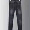 Męski projektant dżinsów klasyczny dżinsy literowe oczy Szczupły rozciąganie tekstury prosta noga luksusowe pranie odporne na zużycie górnego rzędu motocykl retro spodnie biznesowe ndo8
